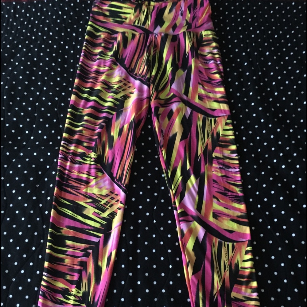 80’s inspired multicolored leggings. One size fits